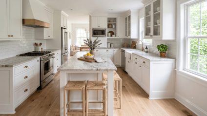 White cabinets with a light veined countertop creating a low-contrast kitchen palette